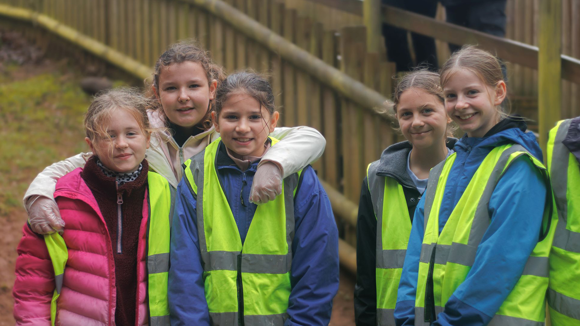 Education-children-smiling-at-the-camera-high-res-landscape-1920x1080