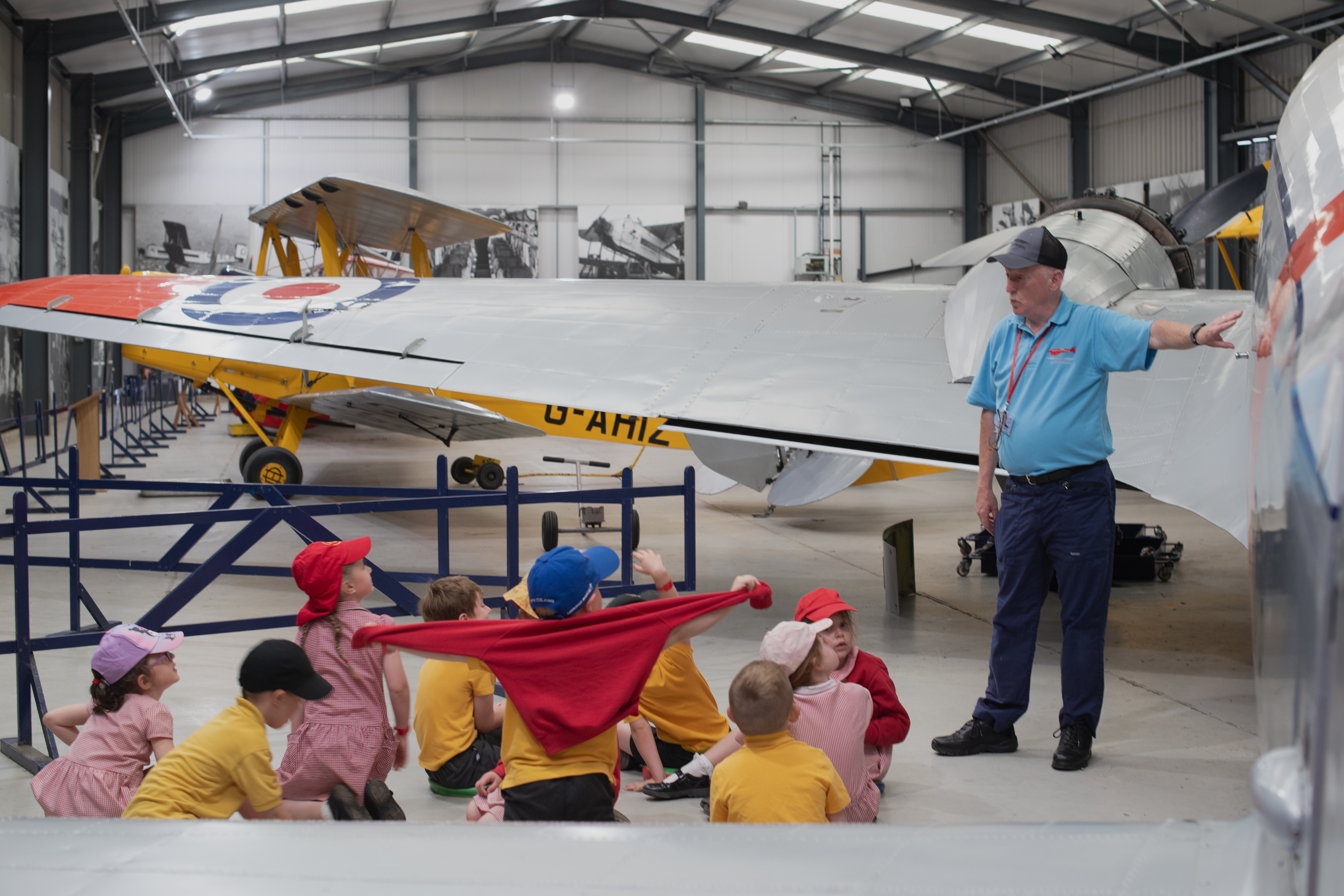 Speaking to a school group in the Hangars. © The Shuttleworth Trust. Photo Phil Chaplin